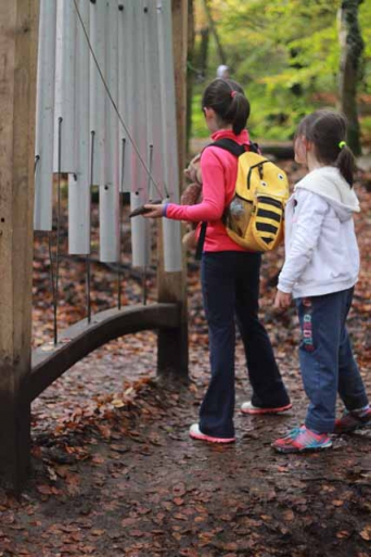 girls at wind chimes